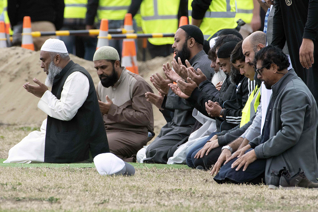 mourners pray while attending a funeral photo afp mourners pray while attending a funeral photo afp