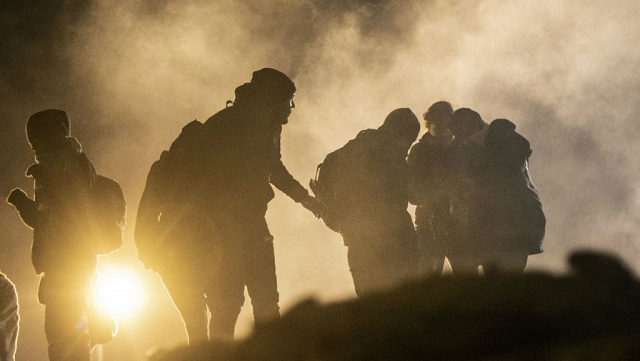 central american migrants run away from tear gas thrown by the us border patrol in tijuana baja california state mexico on january 1 2019 photo afp central american migrants run away from tear gas thrown by the us border patrol in tijuana baja california state mexico on january 1 2019 photo afp