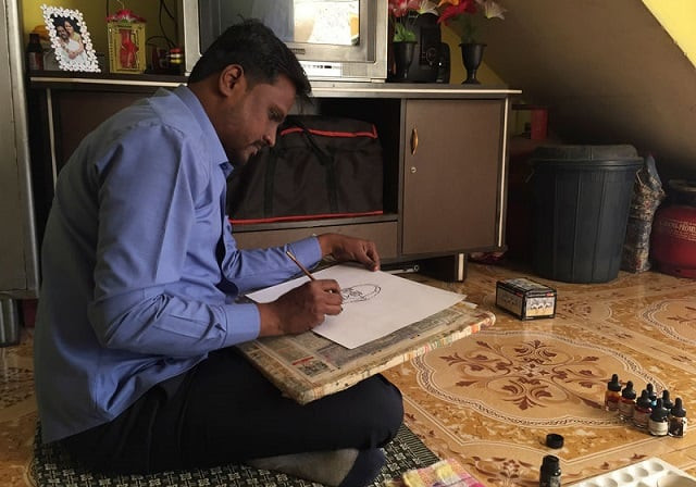 ganesh bhalerao a cartoonist hired by the ruling bharatiya janata party draws a cartoon inside his home in pune india february 28 2019 photo reuters