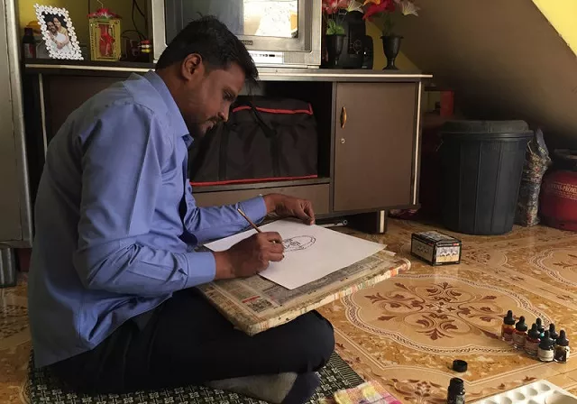 ganesh bhalerao a cartoonist hired by the ruling bharatiya janata party draws a cartoon inside his home in pune india february 28 2019 photo reuters ganesh bhalerao a cartoonist hired by the ruling bharatiya janata party draws a cartoon inside his home in pune india february 28 2019 photo reuters