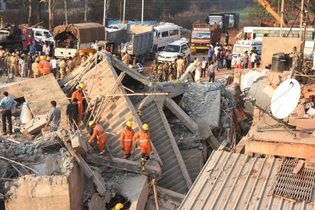 rescuers searching for survivors on march 20 2019 after a building collapsed in the dharwad district of karnataka photo afp rescuers searching for survivors on march 20 2019 after a building collapsed in the dharwad district of karnataka photo afp
