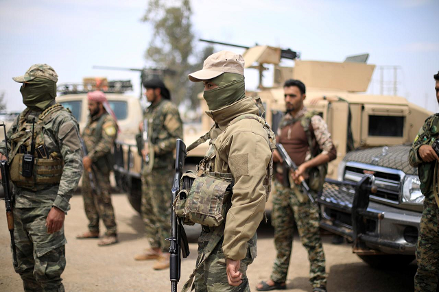 the sdf has been battling to capture baghouz at the iraqi border for weeks photo reuters the sdf has been battling to capture baghouz at the iraqi border for weeks photo reuters