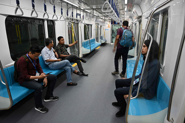 passengers on board a jakarta mass rapid transit mrt coach during a trial run in the city photo afp passengers on board a jakarta mass rapid transit mrt coach during a trial run in the city photo afp