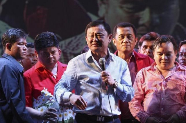 former thai prime minister thaksin shinawatra c addresses his supporters during a ceremony in siem reap province cambodia april 14 2012 photo reuters file former thai prime minister thaksin shinawatra c addresses his supporters during a ceremony in siem reap province cambodia april 14 2012 photo reuters file