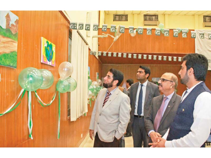 numl dg muhammad ibrahim looks at art works of students photo express