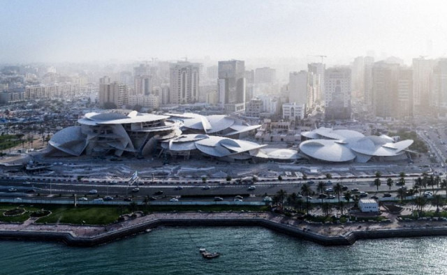 the new national museum of qatar which was designed by french architect jean nouvel features a multi curved roof which resembles a jigsaw puzzle photo afp the new national museum of qatar which was designed by french architect jean nouvel features a multi curved roof which resembles a jigsaw puzzle photo afp