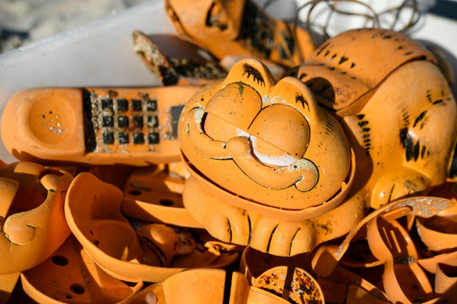 the group had long suspected a lost shipping container was to blame for the plastic pieces of the novelty landline phones that have plagued the northern finistere beaches photo afp