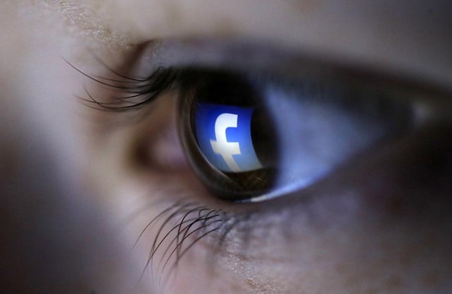 a picture illustration shows a facebook logo reflected in a person 039 s eye in zenica march 13 2015 photo reuters