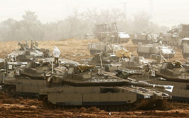 this picture taken on march 30 2019 shows israeli merkava main battle tanks stationed near the border with the gaza strip in southern israel photo afp this picture taken on march 30 2019 shows israeli merkava main battle tanks stationed near the border with the gaza strip in southern israel photo afp