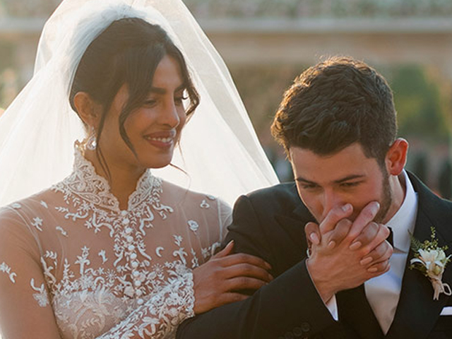 Nick Jonas looks perplexed by his wife Priyanka Chopra's 75-foot long veil