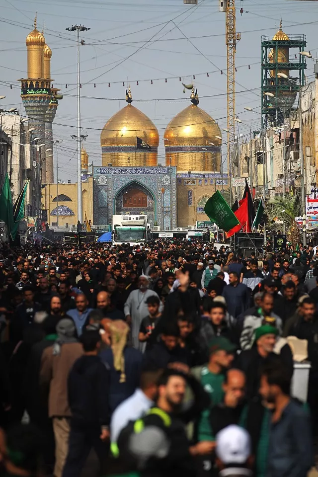 shiite muslim pilgrims march outside the imam musa al kadhim mosque in the iraqi capital s northern district of kadhimiya on april 2 2019 as they prepare to mark later this week the anniversary of the seventh shiite imam 039 s death in the 8th centry photo afp shiite muslim pilgrims march outside the imam musa al kadhim mosque in the iraqi capital s northern district of kadhimiya on april 2 2019 as they prepare to mark later this week the anniversary of the seventh shiite imam 039 s death in the 8th centry photo afp