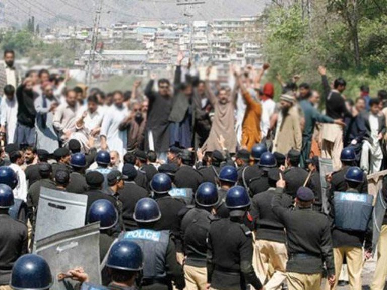 people protest alleged police brutality in ajk