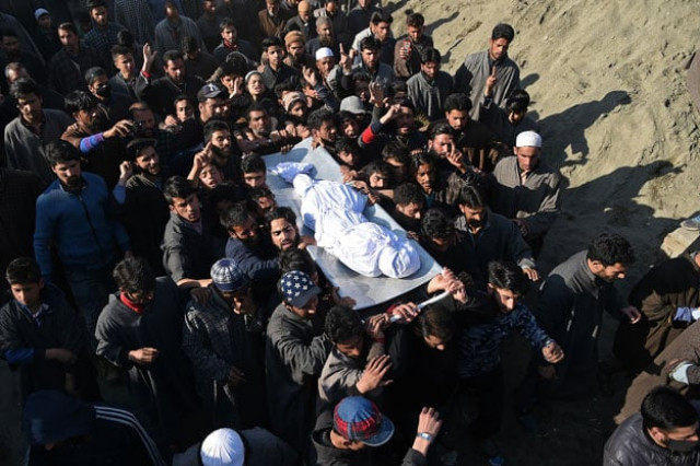 kashmiri villagers carry a charred body of a twelve year old boy aatif mir during a funeral procession in hajin area in bandipora district of occupied kashmir on march 22 2019 photo afp kashmiri villagers carry a charred body of a twelve year old boy aatif mir during a funeral procession in hajin area in bandipora district of occupied kashmir on march 22 2019 photo afp