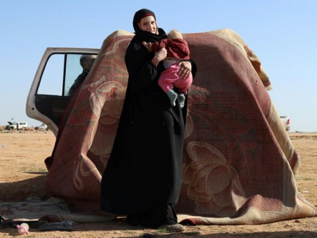 leonora a 19 year old german national who married into the islamic state group awaits screening and registration by the syrian democratic forces photo afp leonora a 19 year old german national who married into the islamic state group awaits screening and registration by the syrian democratic forces photo afp