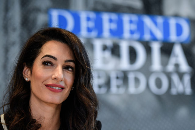 lebanese british human rights lawyer amal clooney holds a press briefing on his media freedom campaign on april 5 2019 in dinard normandy photo afp