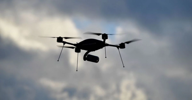 a drone silhouettes against the cloudy sky a google linked firm will start delivering takeaways and other small items to canberra residents after the company received approval from aviation watchdogs in australia photo afp