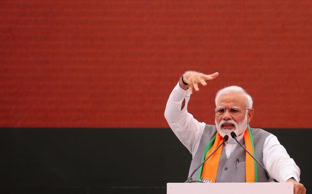 indian prime minister narendra modi gestures at an event to present the bharatiya janata party bjp election manifesto in new delhi on april 8 2019 photo afp