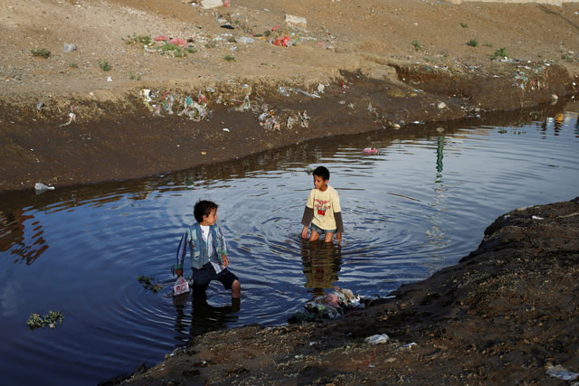hildren play in water at a sewage treatment pool amid an increase of cholera patients in sanaa yemen march 17 2019 reuters