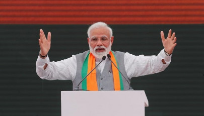 india s modi led alliance closes in on majority survey shows ahead of vote india s modi led alliance closes in on majority survey shows ahead of vote