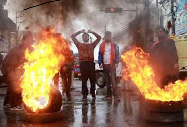 demonstrators shout slogans next to burning tyres during a protest against the killing of a leader of india 039 s ruling hindu nationalist bharatiya janata party 039 s bjp and his brother by unidentified gunmen in kishtwar town in jammu november 2 2018 reuters file