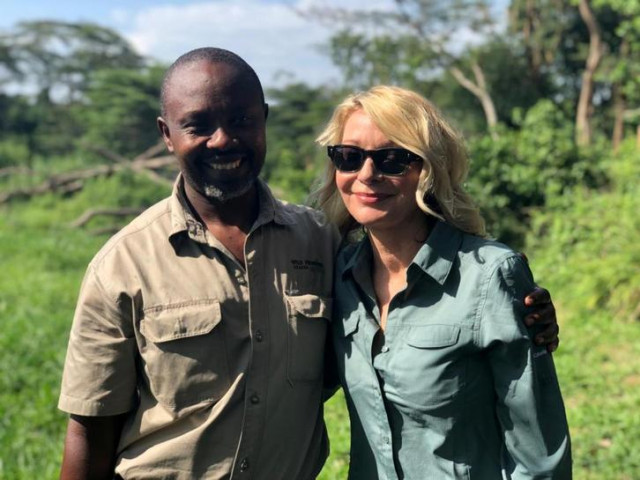 tourist kimberley sue endecott and guide jean paul mirenge remezo photo reuters