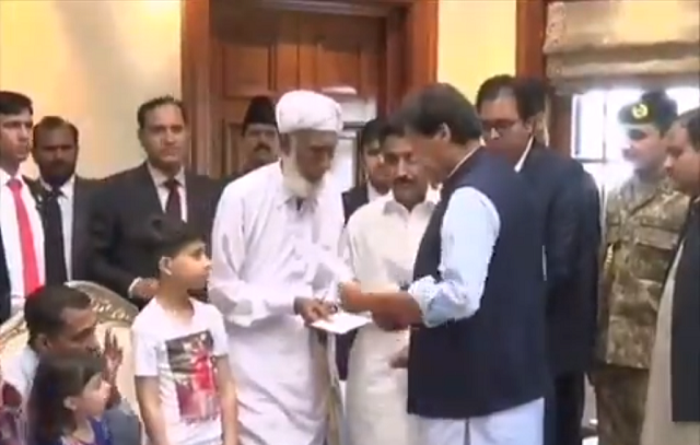 country 039 s premier gives out cheque to the family on behalf of the government screengrab twitter ptiofficial country 039 s premier gives out cheque to the family on behalf of the government screengrab twitter ptiofficial
