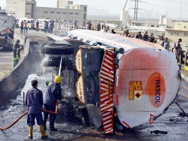a fire erupted after thousands of litres of diesel spilled onto the road from an overturned tanker on wednesday morning photo ppi a fire erupted after thousands of litres of diesel spilled onto the road from an overturned tanker on wednesday morning photo ppi