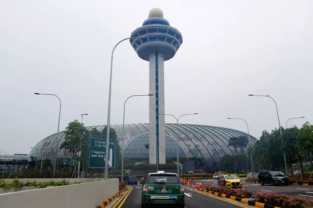 the facade of jewel and the control tower of changi airport are seen in singapore april 11 2019 photo reuters the facade of jewel and the control tower of changi airport are seen in singapore april 11 2019 photo reuters