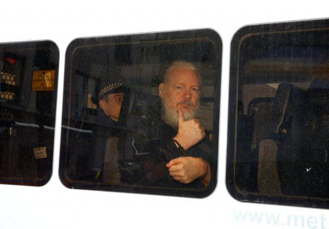wikileaks founder julian assange is seen in a police van after was arrested by british police outside the ecuadorian embassy in london on thursday photo reuters wikileaks founder julian assange is seen in a police van after was arrested by british police outside the ecuadorian embassy in london on thursday photo reuters