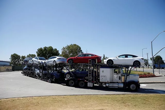 a car carrier trailer carries tesla model 3 electric sedans is seen outside the tesla factory in fremont california us june 22 2018 photo reuters a car carrier trailer carries tesla model 3 electric sedans is seen outside the tesla factory in fremont california us june 22 2018 photo reuters