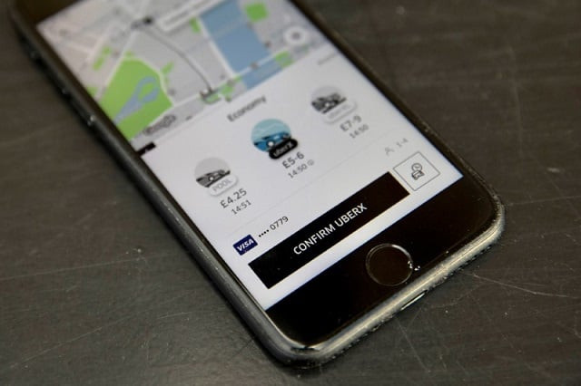 a photo illustration shows the uber app on a mobile telephone as it is held up for a posed photograph in london britain november 10 2017 photo reuters a photo illustration shows the uber app on a mobile telephone as it is held up for a posed photograph in london britain november 10 2017 photo reuters