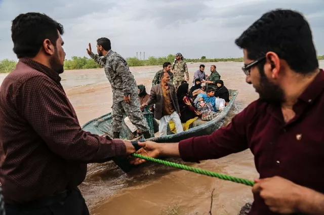 floods have forced hundreds of thousands of people to evacuate from cities and villages photo afp floods have forced hundreds of thousands of people to evacuate from cities and villages photo afp