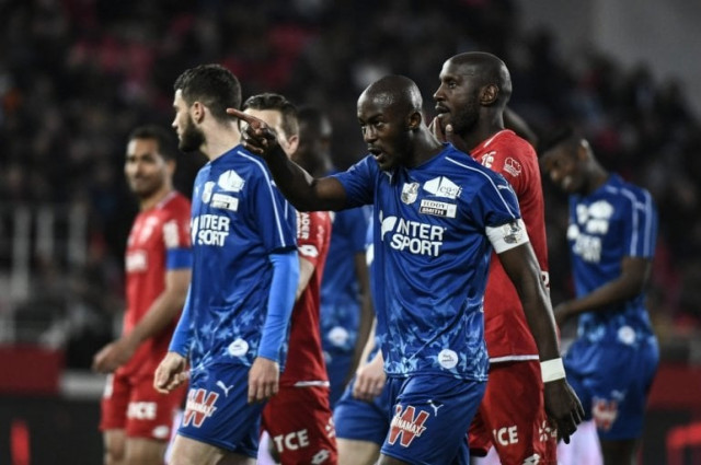 the clash was halted in the 78th minute as players from both sides stopped playing and headed towards the touchline photo afp the clash was halted in the 78th minute as players from both sides stopped playing and headed towards the touchline photo afp