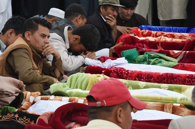 members of quetta 039 s hazara community mourn during the funeral of victims of friday 039 s blast in hazar ganji market photo afp