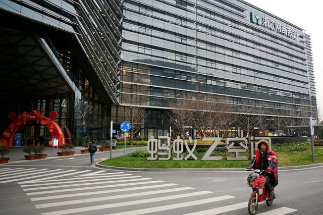 a man cycles past a building bearing the logo of mybank an online lender that is an offshoot of alibaba at the ant financial services headquarters in hangzhou zhejiang province china january 24 2018 photo reuters a man cycles past a building bearing the logo of mybank an online lender that is an offshoot of alibaba at the ant financial services headquarters in hangzhou zhejiang province china january 24 2018 photo reuters