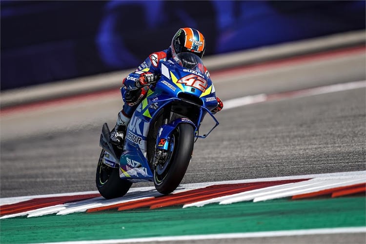 new record rins celebrated his first career motogp win all the while becoming the first man to win in texas in all three categories photo afp