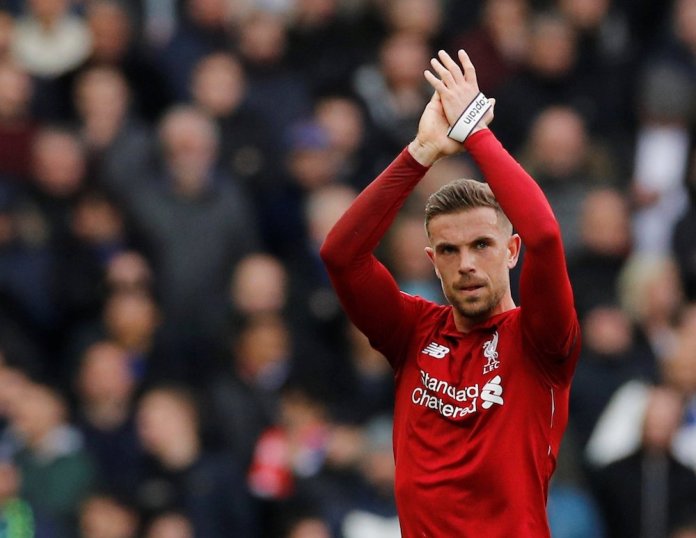 second half goals from sadio mane    created by henderson 039 s pinpoint cross    and mohamed salah wrapped up three points for liverpool photo afp