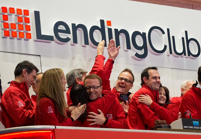 renaud laplanche 2nd r founder and ceo of lending club celebrates with company executives after ringing the opening bell during their ipo at the new york stock exchange nyse in new york us december 11 2014 photo reuters