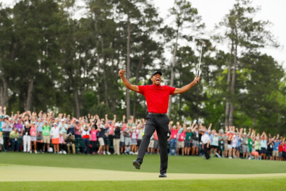 woods climbs to world number six after masters victory