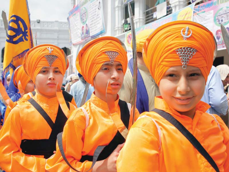 sikh devotees participate in the baisakhi festival at the panja sahib in hasanabdal photo reuters