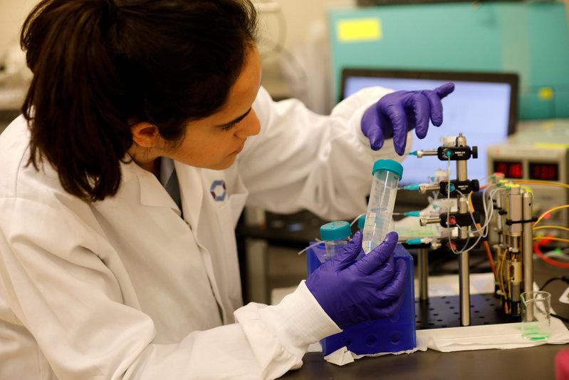 a technician works in a laboratory photo reuters