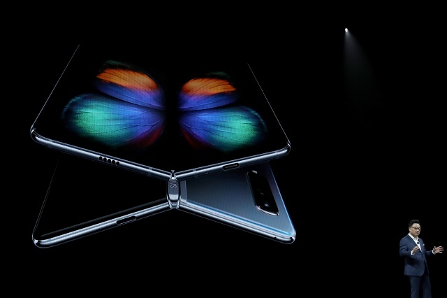 dj koh announces the new samsung galaxy fold smartphone during the samsung unpacked event on wednesday in san francisco photo afp
