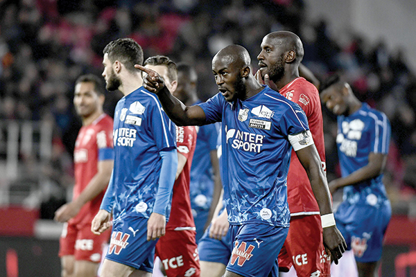 gouano and other players remonstrated with fans after monkey chants were directed towards the amiens defender and a suspect was later arrested photo afp