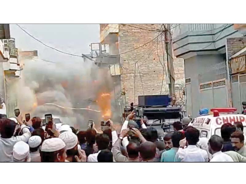 people capture scene of explosion at the house where police and security forces killed five militants photo express