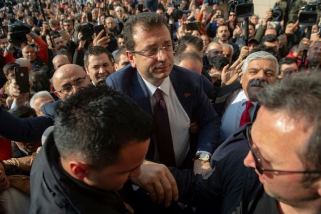 cheering supporters packed the streets to greet opposition candidate ekrem imamoglu c at the istanbul court where he received his mandate certificate photo afp cheering supporters packed the streets to greet opposition candidate ekrem imamoglu c at the istanbul court where he received his mandate certificate photo afp