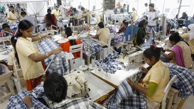 employees work in a factory of babylon garments in dhaka photo reuters