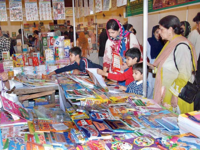visitors browse through books at the 10th national book festival being held at the pak china friendship centre in islamabad photo app visitors browse through books at the 10th national book festival being held at the pak china friendship centre in islamabad photo app