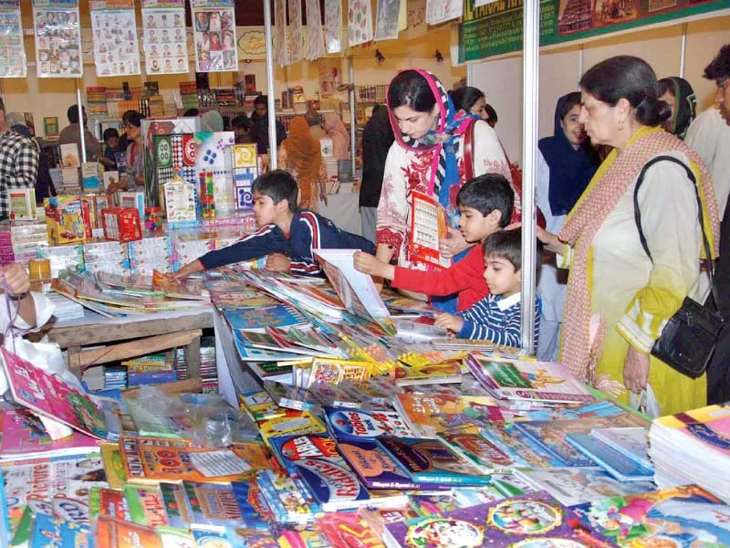 visitors browse through books at the 10th national book festival being held at the pak china friendship centre in islamabad photo app visitors browse through books at the 10th national book festival being held at the pak china friendship centre in islamabad photo app