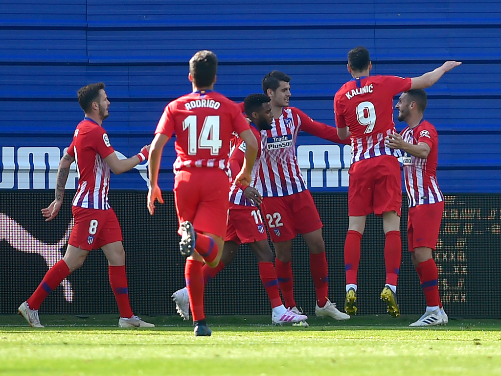 the win took atletico six points behind barca but the catalans promptly restored their nine point advantage at the top by beating real sociedad 2 1 at home photo afp