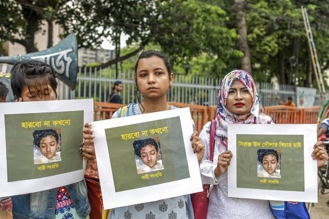 in this photo taken on april 12 2019 bangladeshi women hold placards and photographs of schoolgirl nusrat jahan rafi at a protest in dhaka following her murder by being set on fire after she had reported a sexual assault a schoolgirl was burned to death in bangladesh on the orders of her head teacher after she reported him for sexually harassing her police said april 19 the death of 19 year old nusrat jahan rafi last week sparked protests across the south asian nation with the prime minister promising to prosecute all those involved photo afp file in this photo taken on april 12 2019 bangladeshi women hold placards and photographs of schoolgirl nusrat jahan rafi at a protest in dhaka following her murder by being set on fire after she had reported a sexual assault a schoolgirl was burned to death in bangladesh on the orders of her head teacher after she reported him for sexually harassing her police said april 19 the death of 19 year old nusrat jahan rafi last week sparked protests across the south asian nation with the prime minister promising to prosecute all those involved photo afp file